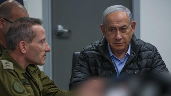 Israeli Prime Minister Benjamin Netanyahu attending a meeting in the command centre of the defence ministry in Tel Aviv during the strike.