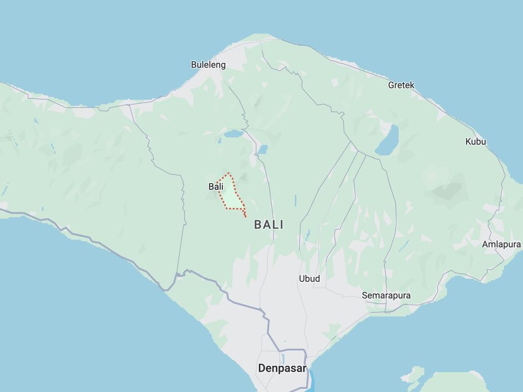 An Australian woman has died alongside one other after a landslide swept away their Bali villa.