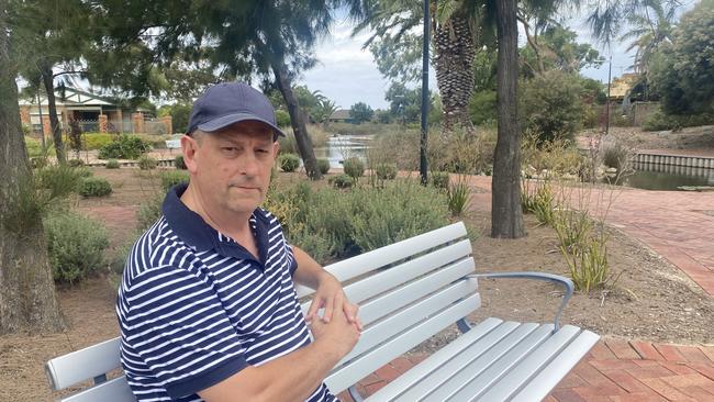 Upset lake user Tim Sylvester sitting on his favourite chair at Freshwater Lake. Picture: Brinley Duggan