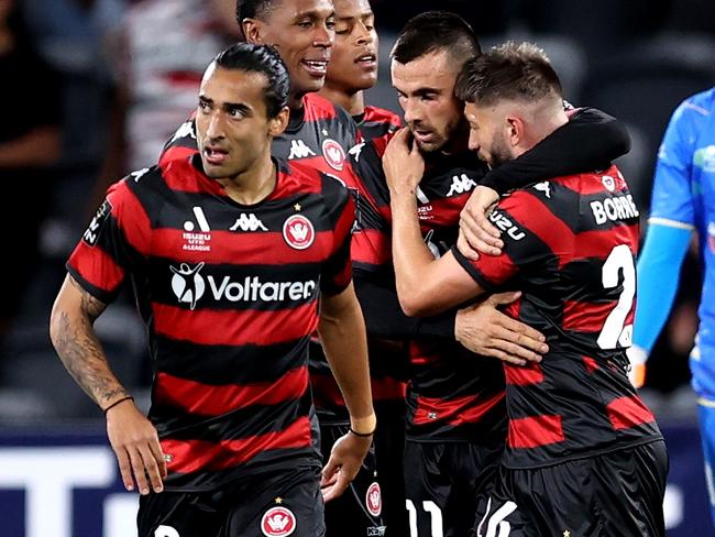 SYDNEY, AUSTRALIA - OCTOBER 28: Brandon Borrello of the Wanderers celebrates scoring a goal with team mates during the round four A-League Men's match between Western Sydney Wanderers and Newcastle Jets at CommBank Stadium, on October 28, 2022, in Sydney, Australia. (Photo by Brendon Thorne/Getty Images)