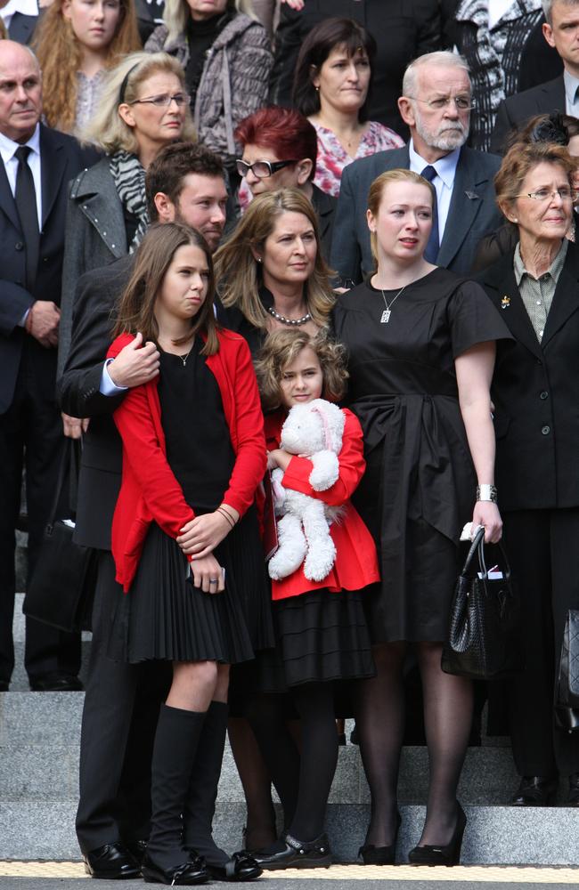 The funeral of Ken Talbot at St. Johns cathedral in July 2010: Amanda Talbot with Liam, Courtney, Alex, 11 and Claudia, 8. Picture: Rob Maccoll