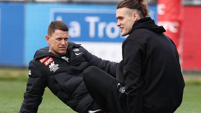 MELBOURNE - AFL. Collingwood training at Olympic Park. Darcy Moore of the Magpies talks with Brendon Bolton. Picture by Michael Klein