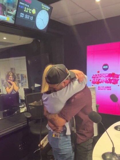 Dylan Schmidt proposed to Charlotte Simmons at Mix 102.3 studios. Picture: Supplied