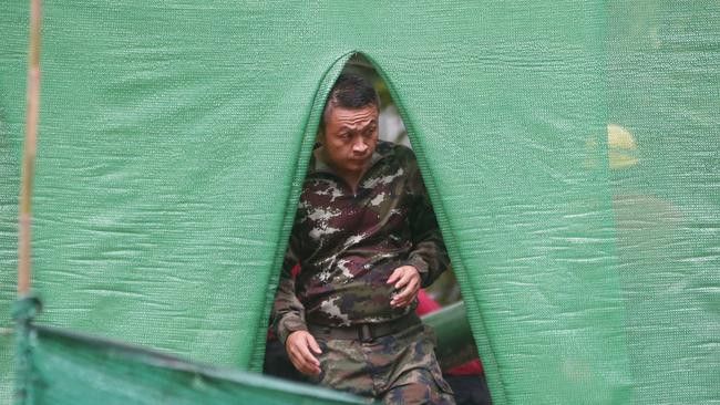 A rescuer leaves the cave. Picture: AP Photo/Sakchai Lalit