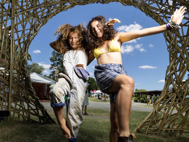 HOLDING FOR THE COURIER MAIL -  Friends Gioia Miah and Lilah Shapiro from Melbourne get into the groove at inside the Woodford Folk Festival on Boxing Day. Picture Lachie Millard