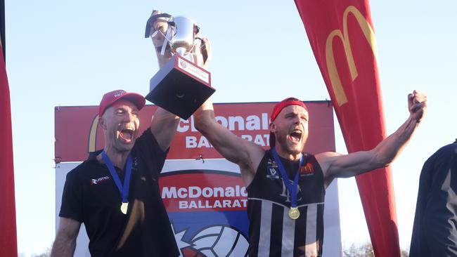 Darley coach Dan Jordan and star midfielder Brett Bewley celebrate the Ballarat league premiership win in 2023. Picture: Hamish Blair