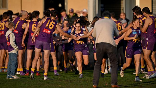 VAFA: Collegians players run out for the game against Coburg. Picture: Andy Brownbill