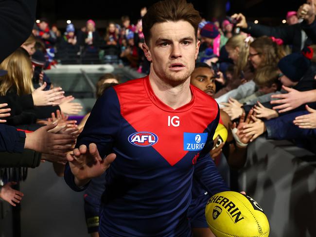 MELBOURNE, AUSTRALIA – JUNE 22: Bayley Fritsch of the Demons runs out onto the field during the round 15 AFL match between Melbourne Demons and North Melbourne Kangaroos at Melbourne Cricket Ground, on June 22, 2024, in Melbourne, Australia. (Photo by Quinn Rooney/Getty Images)