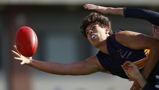 Cooper Trembath of Whitefriars College attempts to mark the ball during the Herald Sun Shield Senior Boys Grand Final between Whitefriars College and St Patrick's Ballarat at Box Hill City Oval on August 03, 2022 in Melbourne, Australia. (Photo by Daniel Pockett/AFL Photos/via Getty Images)