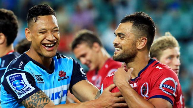 Israel Folau and Karmichael Hunt after the Waratahs-Reds derby. Picture: Mark Evans