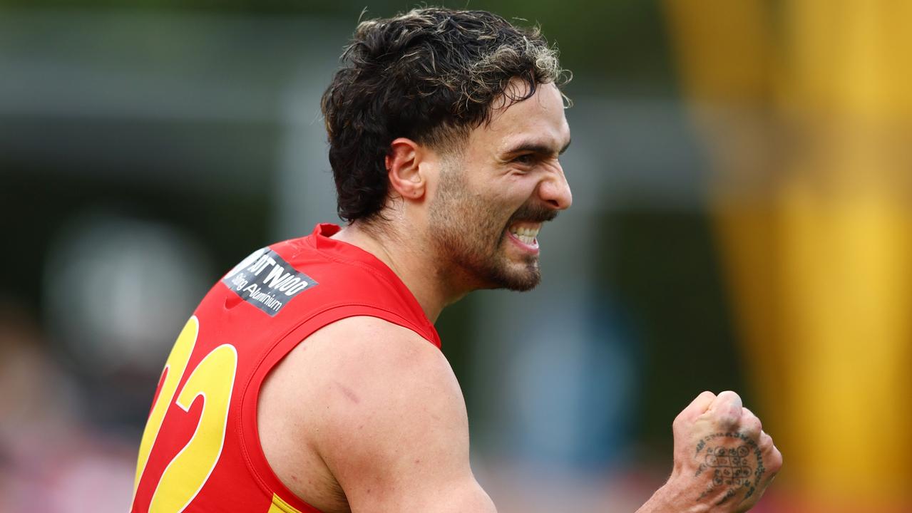 GOLD COAST, AUSTRALIA - JULY 31: Izak Rankine of the Suns celebrates during the round 20 AFL match between the Gold Coast Suns and the West Coast Eagles at Metricon Stadium on July 31, 2022 in Gold Coast, Australia. (Photo by Chris Hyde/Getty Images)