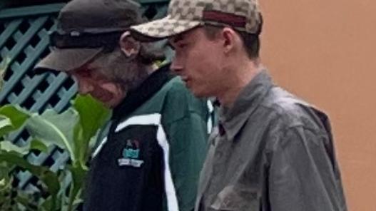 Kolton J Johnston (right) and his stepfather (left) leaving Lismore Court House.