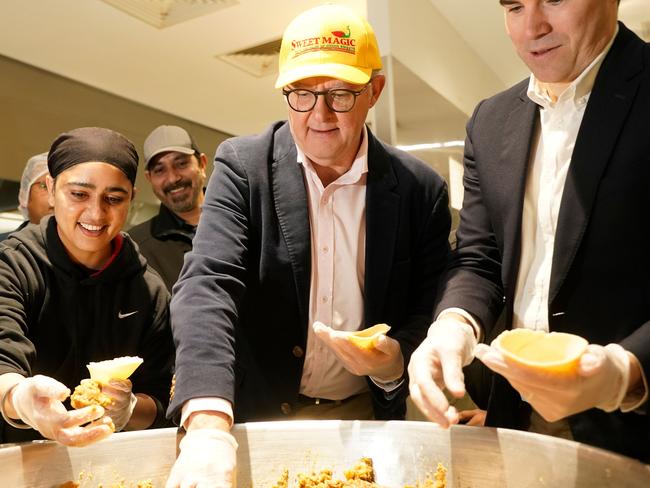 MELBOURNE,AUSTRALIA-NewsWire Photos 30 JUNE, 2024: The Prime Minister, Anthony Albanese, is in Melbourne today with the Member for Gellibrand, Tim Watts, and will visit Sweet Magic in Truganina.They are assisted in the factory by Ashwinder Kaur.  Picture: NCA NewsWire / Valeriu Campan