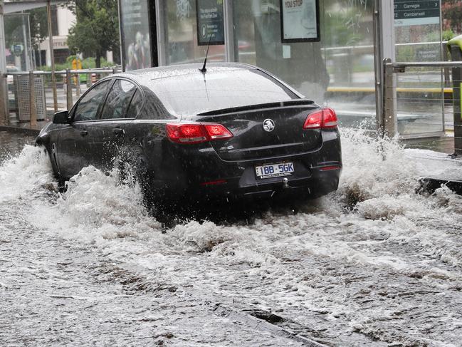 Heavy rain causes flash flooding in the city. Picture: David Crosling