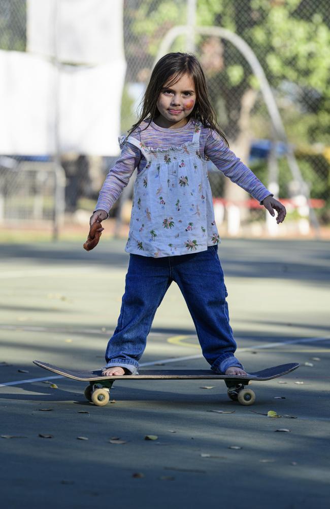 Mayii Weribone learns to skateboard at Sadie's Day Out, a special community event to celebrate the life of five-year-old crash victim Sadie, held at Cambooya State School, Saturday, June 7, 2025. Picture: Kevin Farmer