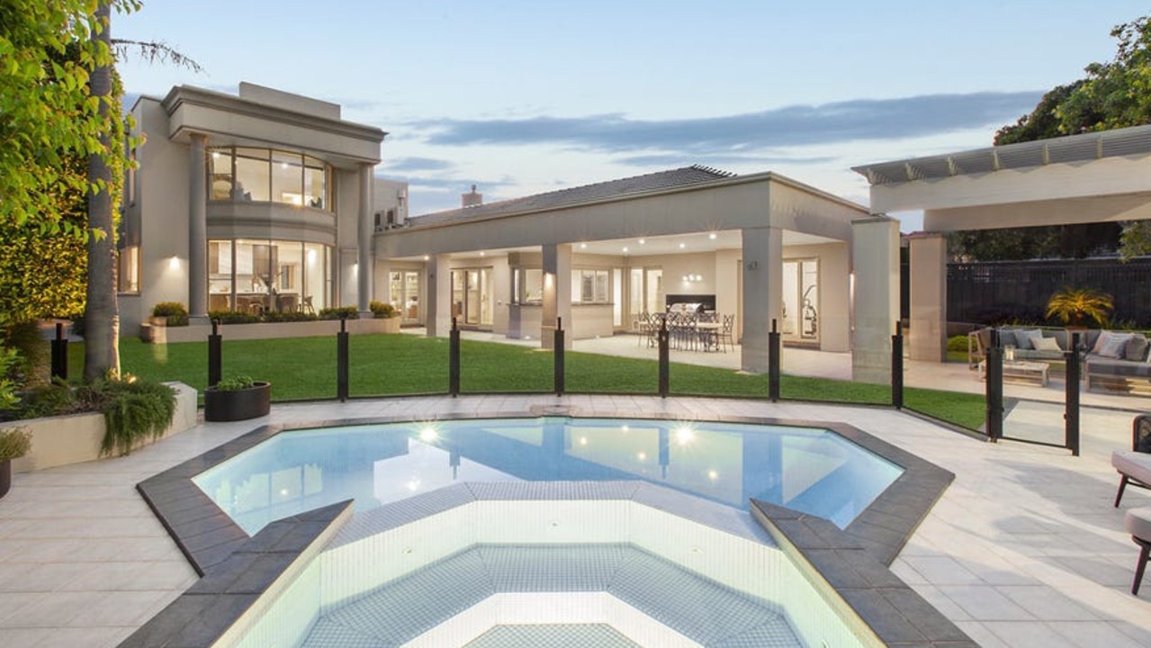 The luxury home comes with a heated pool and spa.