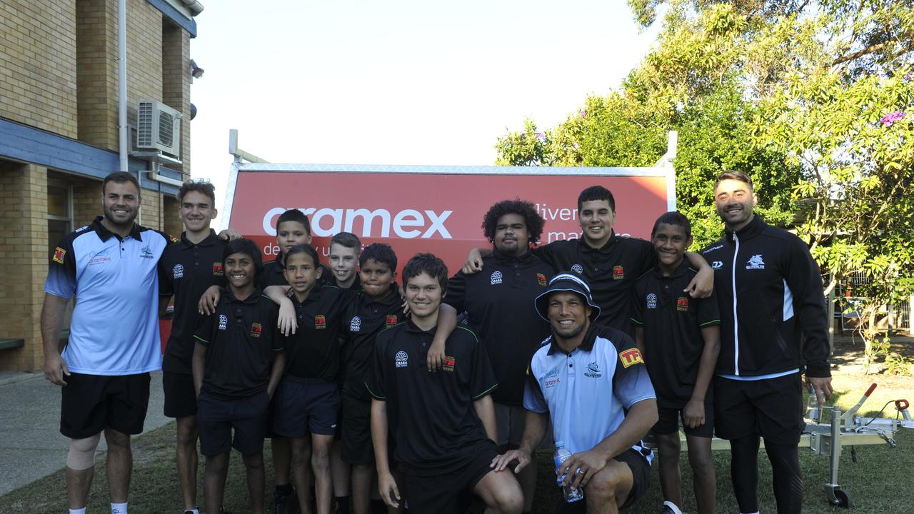 Cronulla Sharks players Shaun Johnson, Wade Graham and Will Chambers visit Orara High School. Sharks major sponsor Aramex made a $5000 donation to the Clontarf Foundation which operates at the school.