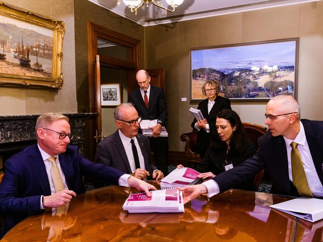 SYDNEY, AUSTRALIA - NewsWire Photos JUNE 29, 2023: President of the Legislative Council Ben Franklin, The Speaker of the New South Wales Legislative Assembly Greg Piper - black tie - receive the ICAC report on former NSW Premier Gladys Berejiklian. Also pictured is Ms Catherine Colquhoun, Acting Solicitor of the Commission, ICAC AND Mr Lewis Rangott, Executive Director Corruption Prevention, ICAC. June 29, 2023. Picture: NCA NewsWire / pool / James Brickwood