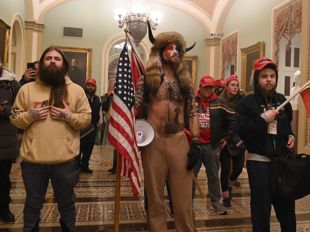 The far-right cult has been linked to the Capitol Hill insurrection and is listed by the FBI as a domestic terror threat. Picture: Saul Loeb / AFP