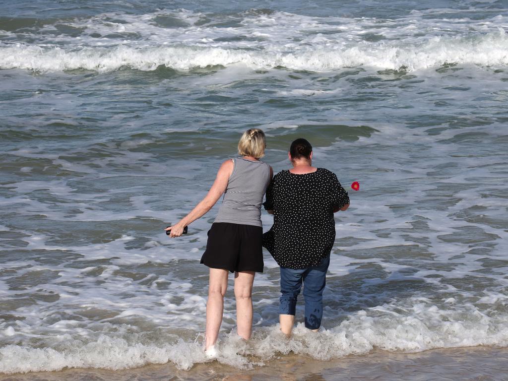 Hundreds of people have gathered at Bribie Island for a vigil to honour 17-year-old shark attack victim Charlize Zmuda. Picture: David Clark