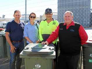 BIN A BIG HELP: Cr Tony Williams, Stephanie Foote and Neil Xavier of JRFC with Cr Neil Fisher. Picture: contributed