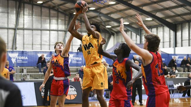 Western Australia’s Josh Ibukunoluwa gets to the rim against South Australia. Picture: Sports in Focus