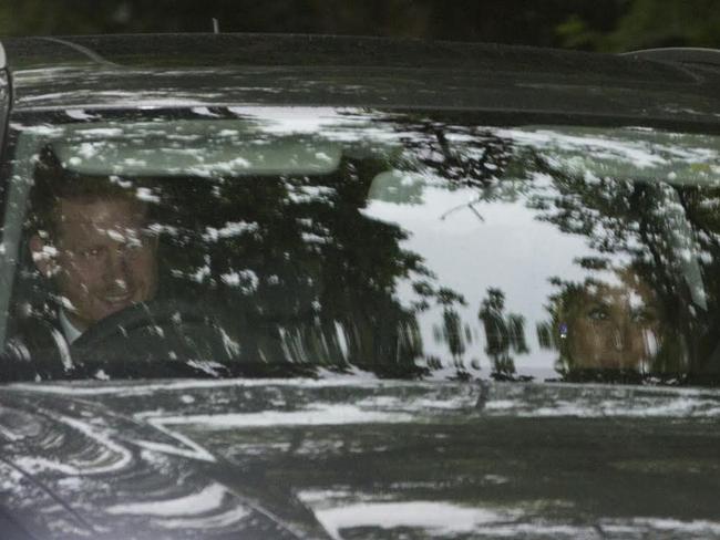 Prince Harry drives Meghan Markle, to the wedding reception of Pippa Middleton and her husband James Matthews in July. Picture: News Group Newspapers Ltd.