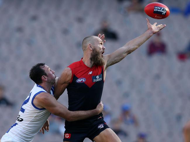 Max Gawn wins the tap over Todd Goldstein. Picture: Michael Klein