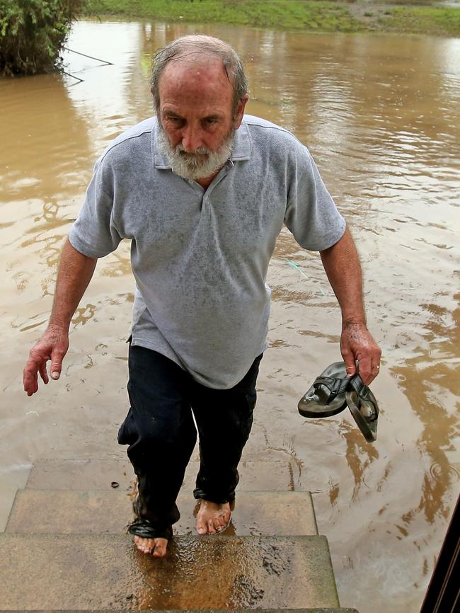 Residents of the small village of Telegraph Point north of Port Macquarie return to their destroyed homes. Milton Mitchell returns to his house. Picture: Nathan Edwards