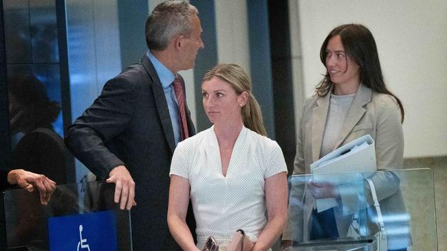 Kah and stablehand Ruby McIntyre leave the white powder hearing in Melbourne. Picture: Tony Gough