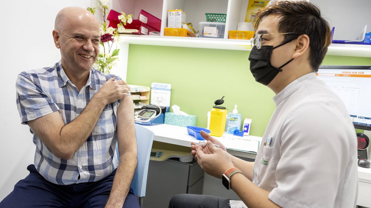 Dr John Gerrard receiving a flu vaccination. Picture: Sarah Marshall