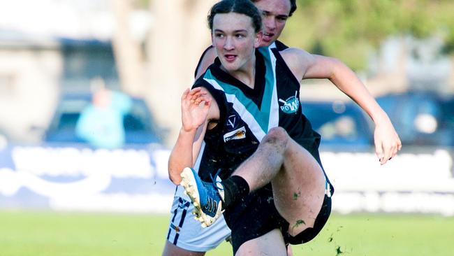 Wonthaggi's Harry Dawson kicks around his body. Picture: Facebook.