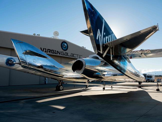 SpaceShipTwo connects to the mothership, WhiteKnightTwo, at Mojave Space Port in California on February 19, 2019. Virgin Galactic will merge with a New York-listed company to become the world's first publicly-traded space tourism venture, the British billionaire's group announced on July 9. Picture: AFP/Virgin Galactic