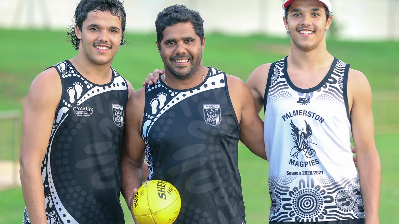 Alwyn Davey and his twin sons Alwyn Jr (right) and Jayden. Picture: Glenn Campbell