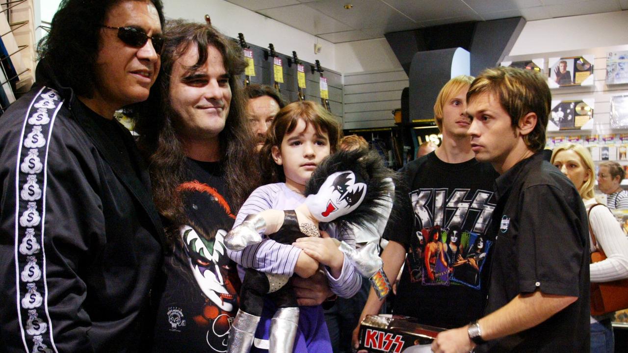 Fans of Kiss meet Gene Simmonds as he makes an instore appearance at Toombul Music