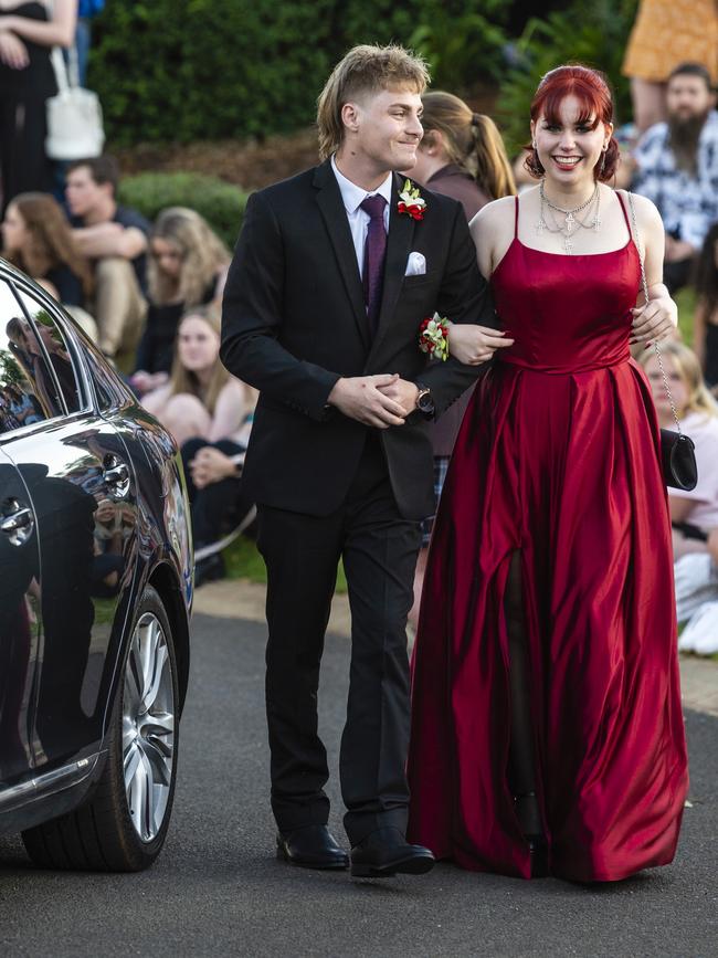 Jason Myers and Brooke Ireland arrive at Harristown State High School formal at Highfields Cultural Centre, Friday, November 18, 2022. Picture: Kevin Farmer