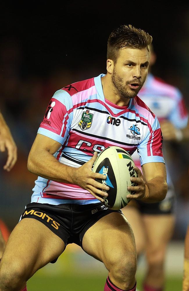 Beau Ryan runs the ball for the Sharks