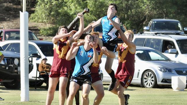 Southern Mallee Thunder coach Kieran Delahunty launches himself over a pack against Warrack Eagles last season. Picture: Georgia Hallam