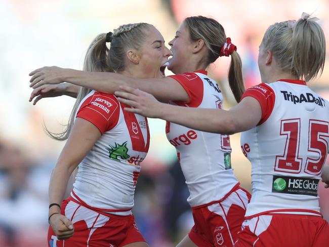 NEWCASTLE, AUSTRALIA - JULY 22: Teagan Berry of the Dragons  celebrates a try during the round one NRLW match between Newcastle Knights and St George Illawarra Dragons at McDonald Jones Stadium, on July 22, 2023, in Newcastle, Australia. (Photo by Scott Gardiner/Getty Images)