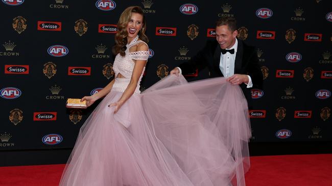 Brit Davis led the way with partner and popular Geelong star Joel Selwood trailing behind as they entered the Brownlow Medal count last night. Picture: Tim Carrafa