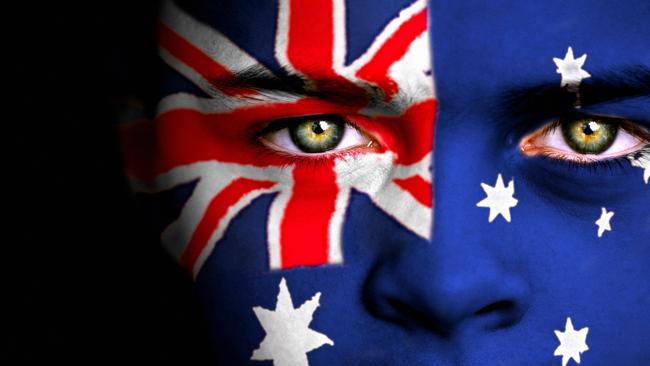 Portrait of a boy with the Australian flag painted on his face