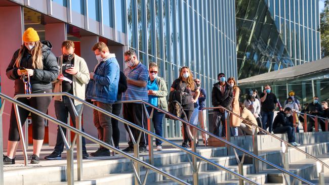 There have been long lines of people at the Melbourne Convention Centre and other state-run vaccination hubs.