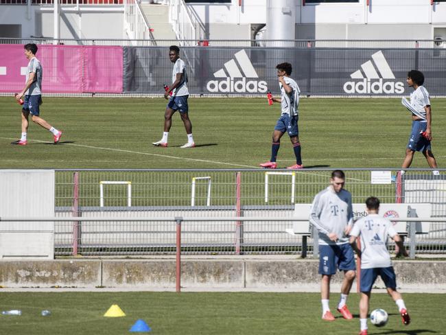 From left: Robert Lewandowski, Alphonso Davies, Kingsley Coman and Joshua Zirkzee soccer player from FC Bayern Munich practice at the club's training ground in Munich, Germany. Picture: dpa via AP