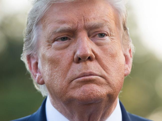 US President Donald Trump speaks to the press as he departs the White House in Washington, DC, on September 22, 2020. - President Trump travels to Pittsburgh, Pennsylvania, for a campaign rally. (Photo by SAUL LOEB / AFP)