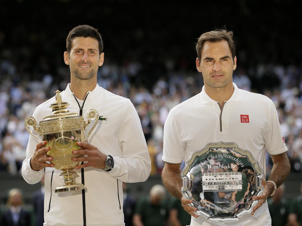 Not the trophy Roger wanted. (AP Photo/Tim Ireland)