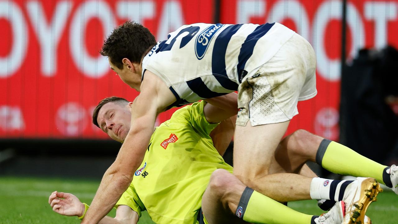 Jeremy Cameron collides with the boundary umpire. Picture: Michael Willson