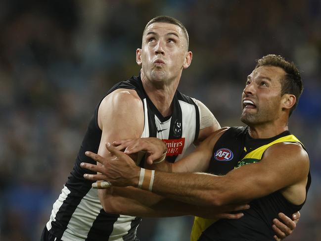 MELBOURNE, AUSTRALIA - MARCH 31: Darcy Cameron of the Magpies and Toby Nankervis of the Tigers contest the ruck during the round three AFL match between Collingwood Magpies and Richmond Tigers at Melbourne Cricket Ground, on March 31, 2023, in Melbourne, Australia. (Photo by Daniel Pockett/Getty Images)