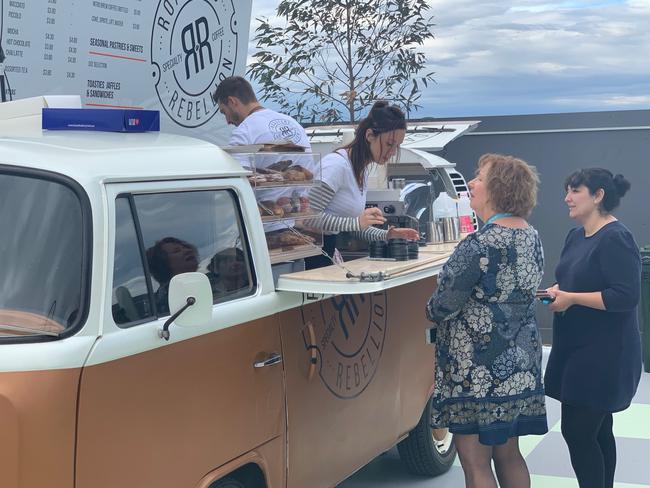 A food truck is set up in the new Rouse Hill Tallawong Station pocket park. .