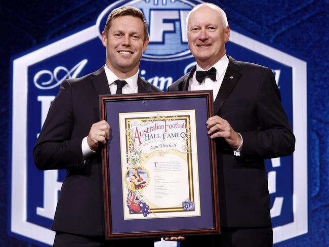 Hall of Fame inductee Sam Mitchell with Richard Goyder at the Australian Football Hall of Fame induction ceremony. (Photo by Michael Willson/AFL Photos/via Getty Images)