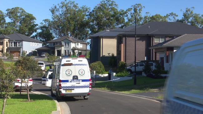 Police in Westwood Court, Harrington Park this morning. Picture: TNV